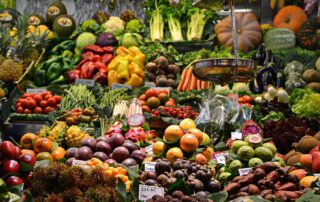 A display of fruits and vegetables managed by software.